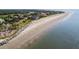 Stunning aerial view of the beach and oceanfront homes at this golf and beach community at 3110 Up Da Creek Ct, Seabrook Island, SC 29455