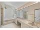 Large bathroom with double vanity, soaking tub, and walk-in shower at 3110 Up Da Creek Ct, Seabrook Island, SC 29455