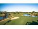 Scenic golf course with winding fairways, water hazards, and lush greenery under a clear blue sky at 3110 Up Da Creek Ct, Seabrook Island, SC 29455
