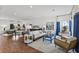 Bright living room with hardwood floors, comfortable seating, and stylish decor creating an inviting space at 3110 Up Da Creek Ct, Seabrook Island, SC 29455