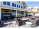 Wonderful outdoor patio with covered seating and fire pit at 3110 Up Da Creek Ct, Seabrook Island, SC 29455