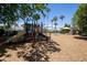 Community playground area with a slide, swings, and palm trees at 3110 Up Da Creek Ct, Seabrook Island, SC 29455