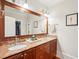 Bathroom featuring a double sink vanity with beautiful marble countertops and traditional style at 34 Frogmore Rd, Mount Pleasant, SC 29464