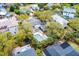 A home with a backyard pool, patio area, and surrounded by mature trees in a quiet neighborhood at 3405 Cameron Blvd, Isle of Palms, SC 29451