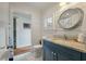 Charming bathroom with shiplap walls, nautical-themed decor, and a view into another bathroom at 3405 Cameron Blvd, Isle of Palms, SC 29451