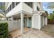 Inviting entryway with a charming blue door, decorative accents, and well-lit entrance at 3405 Cameron Blvd, Isle of Palms, SC 29451