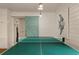 Recreation room featuring a ping pong table, shiplap walls, and stylish lighting at 3405 Cameron Blvd, Isle of Palms, SC 29451