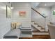 Cozy nook and nearby staircase with wood treads and modern rail system at 3405 Cameron Blvd, Isle of Palms, SC 29451