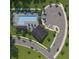 Aerial view of community pool, clubhouse, and parking area at 343 Simone Dr, Daniel Island, SC 29492