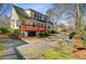Exterior view of a backyard featuring a deck, some shrubbery and an open space at 3447 Toomer Kiln Cir, Mount Pleasant, SC 29466