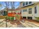 Exterior backyard featuring a wood deck, lush landscaping, and a sunny, inviting outdoor space at 3447 Toomer Kiln Cir, Mount Pleasant, SC 29466