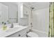 Bright bathroom with white fixtures, including a vanity, toilet, and shower-tub combo at 3447 Toomer Kiln Cir, Mount Pleasant, SC 29466