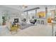 Spacious living room with fireplace, large windows, and open access to the kitchen at 3447 Toomer Kiln Cir, Mount Pleasant, SC 29466
