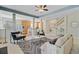 Open-concept living room connected to kitchen and staircase, with modern furniture and decor at 3447 Toomer Kiln Cir, Mount Pleasant, SC 29466