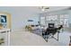 Bright living area with fireplace, comfortable seating, and abundant natural light through large windows at 3447 Toomer Kiln Cir, Mount Pleasant, SC 29466