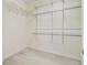 Empty walk-in closet with multiple shelves and rods at 3447 Toomer Kiln Cir, Mount Pleasant, SC 29466