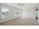 Bedroom featuring carpet, neutral walls, ceiling fan and natural light from windows and door at 349 Wappoo Trace Ln, Summerville, SC 29486