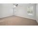 Bright bedroom with carpet, ceiling fan and natural light from two windows at 349 Wappoo Trace Ln, Summerville, SC 29486