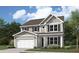 Charming two-story home with a gray exterior, a two-car garage, and a well-manicured lawn at 349 Wappoo Trace Ln, Summerville, SC 29486