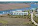 Elevated view of condos and docks nestled beside the marshy waterfront with road access at 3701 Dock Site Rd # 302, Edisto Beach, SC 29438