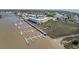 Stunning aerial view of waterfront condo with private boat docks and marshland views at 3701 Dock Site Rd # 302, Edisto Beach, SC 29438
