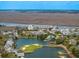 Beautiful aerial view of the condo community and private boat docks on the island at 3701 Dock Site Rd # 302, Edisto Beach, SC 29438