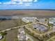 Stunning aerial view of waterfront property with marsh views, a dock, and ample parking at 3701 Dock Site Rd # 302, Edisto Beach, SC 29438