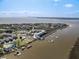 Picturesque aerial showing the neighborhood, condos and the proximity to the ocean at 3701 Dock Site Rd # 302, Edisto Beach, SC 29438