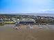 Aerial showing proximity to the ocean and private boat docks for residents at 3701 Dock Site Rd # 302, Edisto Beach, SC 29438