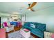 Inviting living room with an open layout to the kitchen, comfortable seating, and nautical accents at 3701 Dock Site Rd # 302, Edisto Beach, SC 29438
