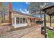 This home features a spacious backyard with a large wooden deck and a sunroom connected to the house at 462 Mount Royall Dr, Mount Pleasant, SC 29464