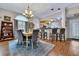 Well-lit dining area boasts a stylish chandelier and offers an inviting space to enjoy meals with loved ones at 462 Mount Royall Dr, Mount Pleasant, SC 29464