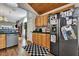 A spacious kitchen features wooden cabinets, stainless steel appliances, and a black and white checkered rug at 462 Mount Royall Dr, Mount Pleasant, SC 29464