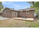 Brick house featuring a cozy backyard deck with seating at 4757 June St, North Charleston, SC 29405