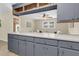 An open kitchen area with ample counter space and an open view into the living room at 4757 June St, North Charleston, SC 29405