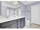 Stylish bathroom featuring double sinks, neutral paint, and modern fixtures at 490 Sanders Farm Ln, Charleston, SC 29492