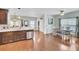 Open floor plan view from kitchen island with stainless dishwasher to breakfast table at 490 Sanders Farm Ln, Charleston, SC 29492