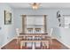 Dining room features a ceiling fan, hardwood floors, and a table with chairs and a bench at 490 Sanders Farm Ln, Charleston, SC 29492