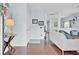 Bright entryway leading to a stylish living room with hardwood floors and plenty of natural light at 490 Sanders Farm Ln, Charleston, SC 29492