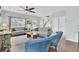 Open-concept living room with hardwood floors, modern decor, and ample natural light at 490 Sanders Farm Ln, Charleston, SC 29492