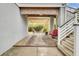 Charming patio area with stone walkway, cozy seating, pergola, and bamboo backdrop, perfect for outdoor relaxation and entertainment at 490 Sanders Farm Ln, Charleston, SC 29492