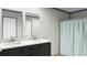 Well-lit bathroom with double vanity, modern fixtures, and a shower-tub combination at 525 Railed Ridge Way, Moncks Corner, SC 29461