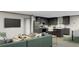Open-concept living space showcasing a kitchen with modern finishes and comfortable living area at 525 Railed Ridge Way, Moncks Corner, SC 29461