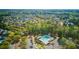 Beautiful aerial view of a Primary planned community with mature trees and a community pool and playground area at 5254 Mulholland Dr, Summerville, SC 29485
