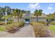 Community pool area with palm trees at 5254 Mulholland Dr, Summerville, SC 29485