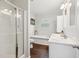 Elegant bathroom with dual sinks, a shower, and a soaking tub at 5638 Dixie Plantation Rd, Hollywood, SC 29449