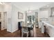 Cozy dining area with hardwood floors located near the kitchen at 5638 Dixie Plantation Rd, Hollywood, SC 29449