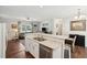 Bright kitchen area with stainless steel appliances and hardwood floors at 5638 Dixie Plantation Rd, Hollywood, SC 29449