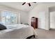 Bedroom featuring carpeted floors, a ceiling fan, and natural light from the window at 601 Buckthorn Cir, Summerville, SC 29483