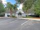 Charming community clubhouse featuring a gated entrance, ample parking, and lush landscaping at 601 Buckthorn Cir, Summerville, SC 29483